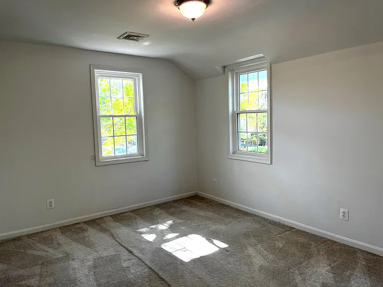 Bedroom 2 is also bright with natural light