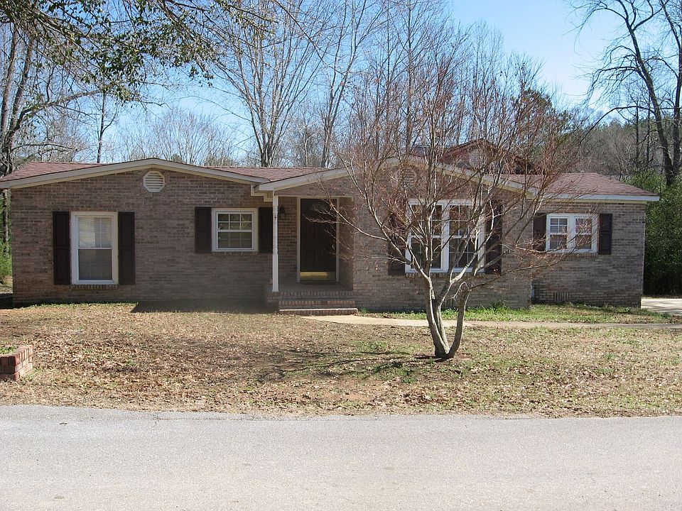 Front view of home with a beautiful Japanese Maple