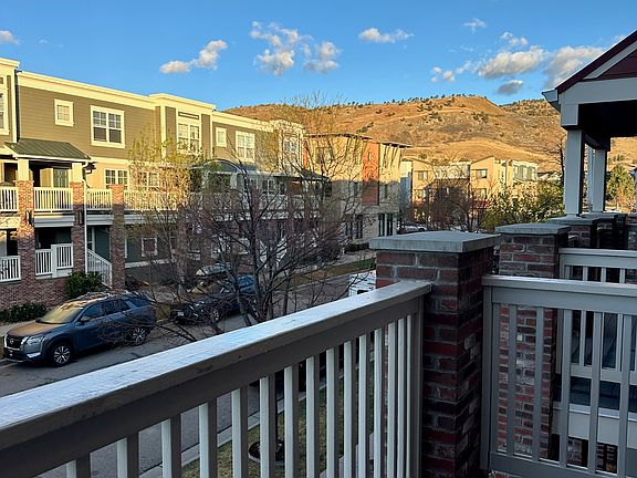 View of the foothills in early evening from entryway private terrace.