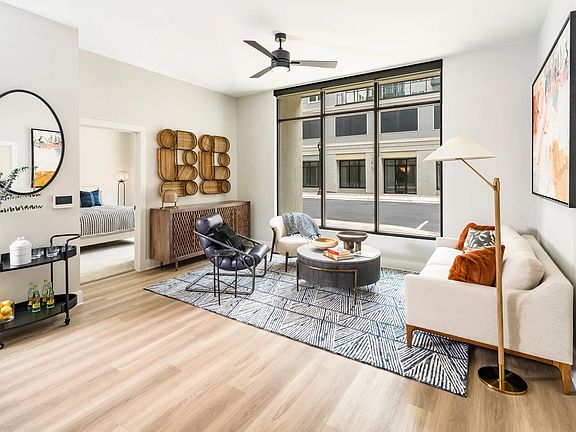 Bright and stylish, the living spaces at Modera Liberty Row feature expansive windows and refined finishes, creating a welcoming home in Charlotte.