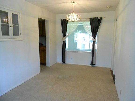 Formal dining room with built in cabinet