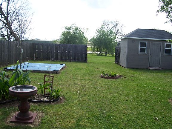 Backyard and Storage Bldg