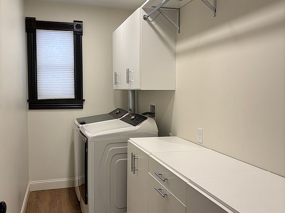 In-unit laundry room with full-size washer and dryer included. Convenient, private, and thoughtfully designed for easy organization and everyday use.
