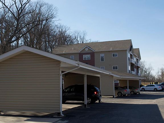 Assigned carport provides covered parking