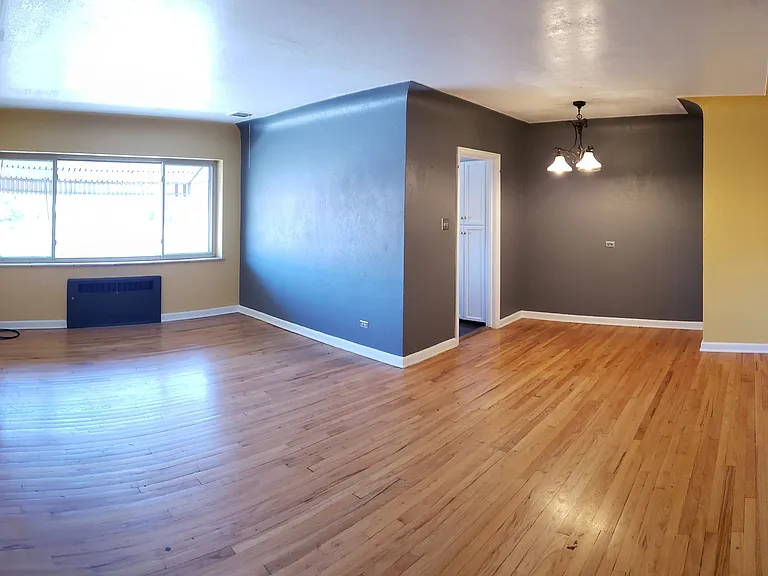 Bright and open living/dining room.