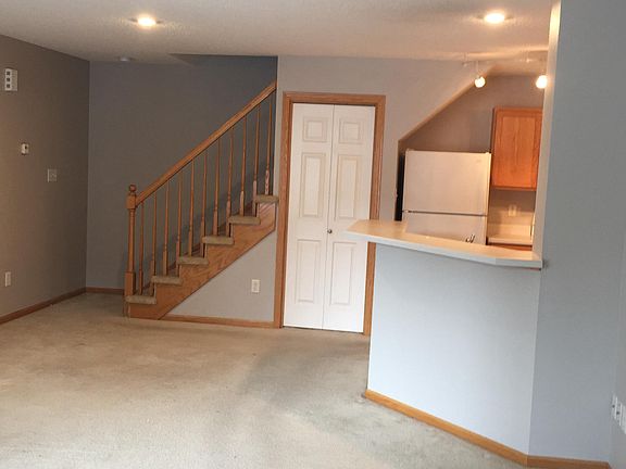 Living/dining Area - kitchen and storage doors