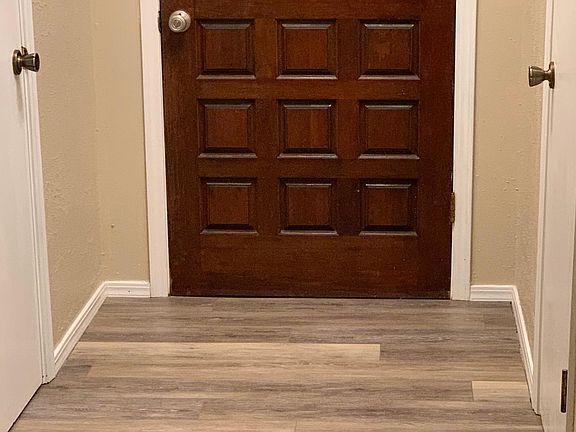 New flooring in entry. Two coat/storage closets.