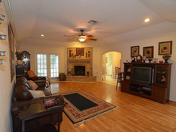 Wonderful family room with updated flooring, lighting and crown molding. Lots of extra space for your oversized furniture.