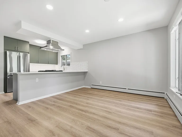 Dining room could also be used as a sizeable family / TV room (with large windows overlooking backyard and TV / internet connection already in wall)