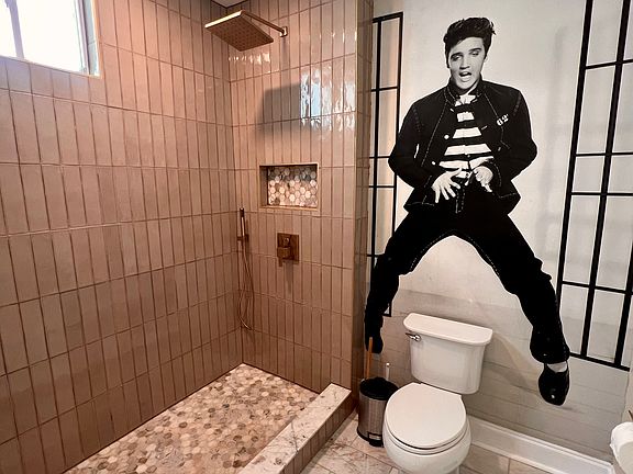 Brand new tiled shower.
