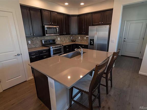 2nd image of 9813 E 58th Dr
