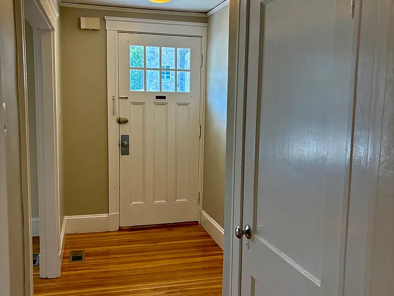 Front entry hall with coat closet