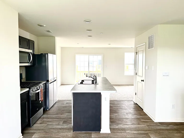 Kitchen looking into Living Room