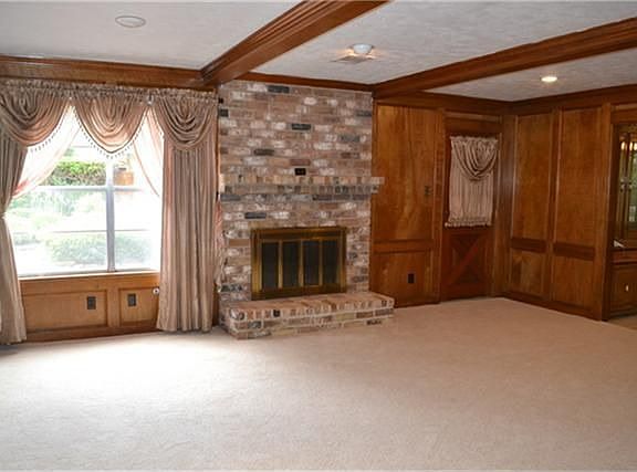 Den with New Carpet.