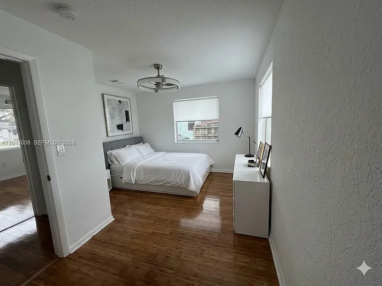 7720 Raleigh St — Photo 12