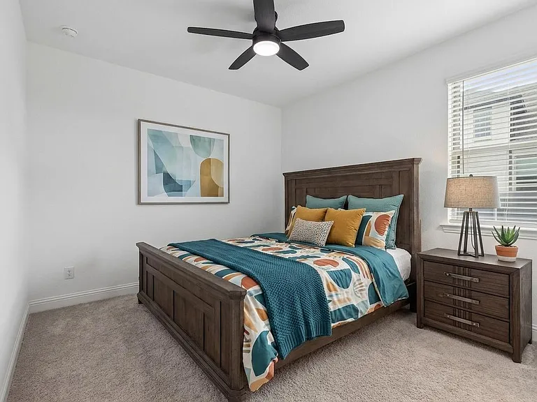 Secondary bedroom 4 is located separate from all other bedrooms and is ensuite, a perfect guest bedroom or in-law suite.