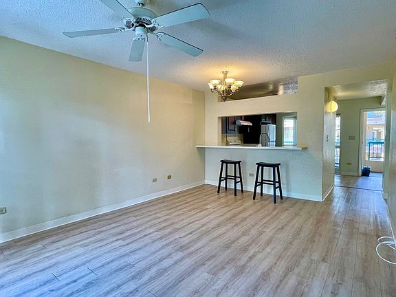 Bar seating in front of kitchen