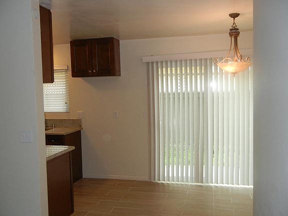Dining area with access to fenced-in patio