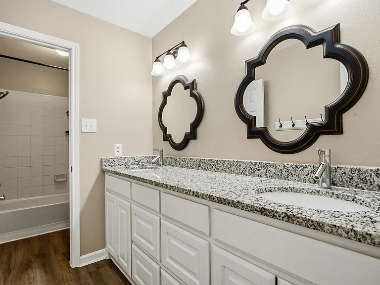 Full bath with dual vanity