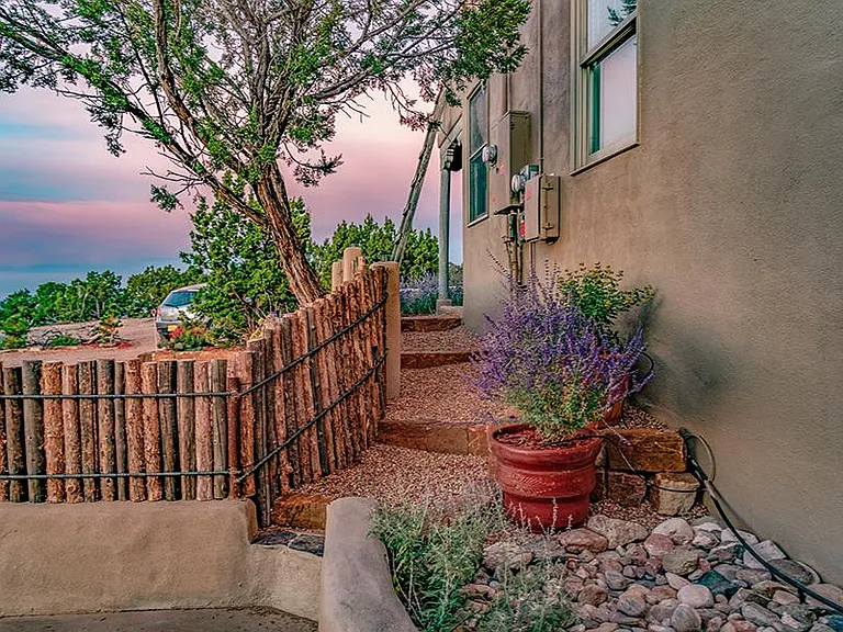 Quaint pathways encircle house
