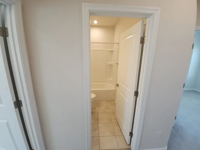 FULL BATHROOM NEXT TO THE ROOMS