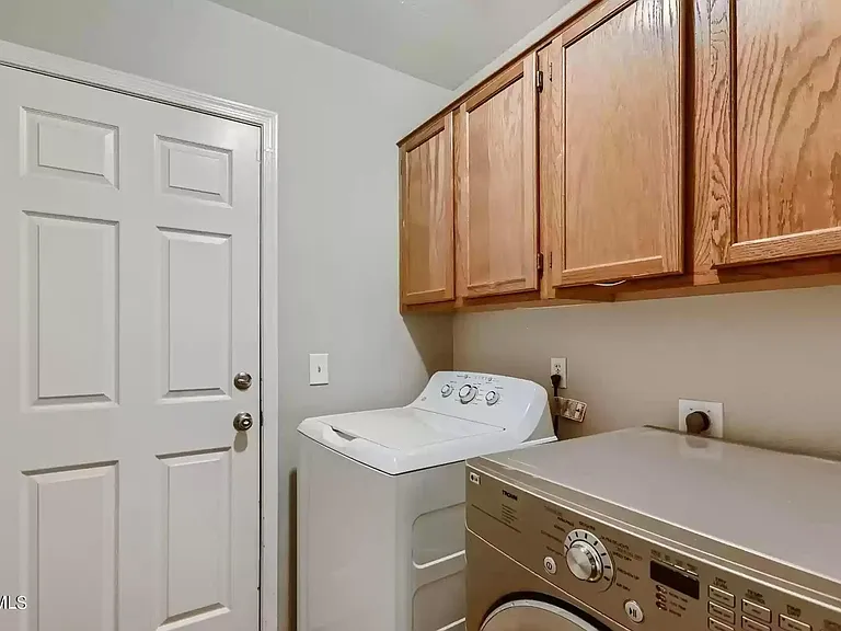 Inside laundry room (machines included)
