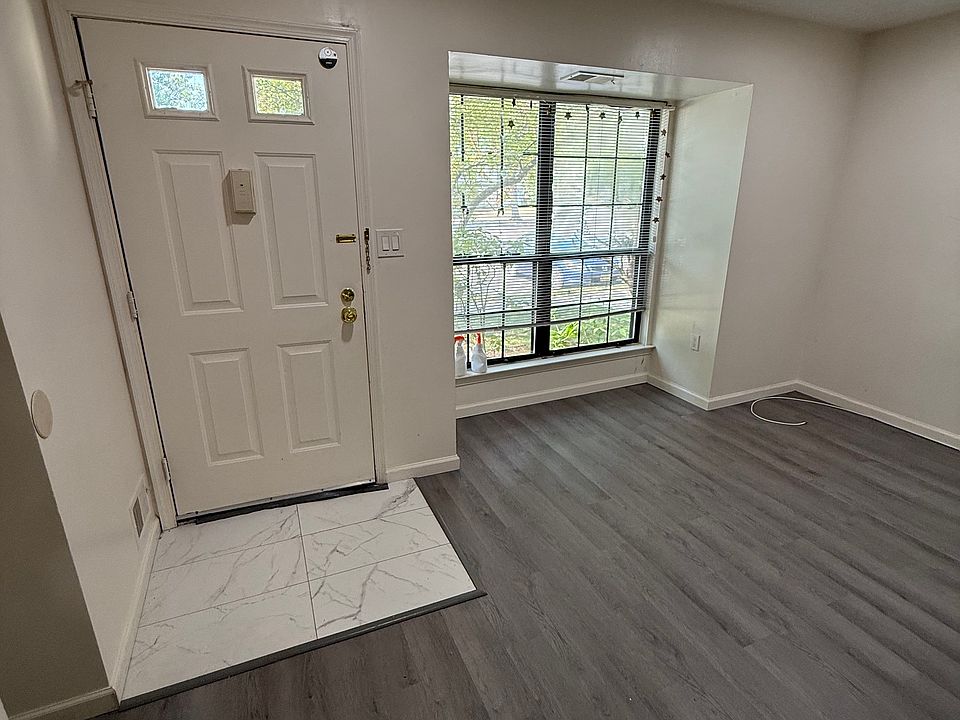 Front door and window facing parking lot