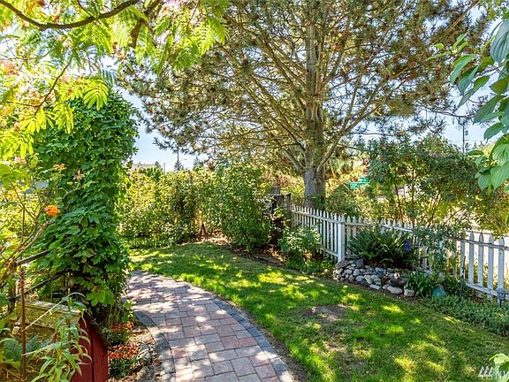 Mature landscaping creates privacy and a lovely habitat for bird watching.