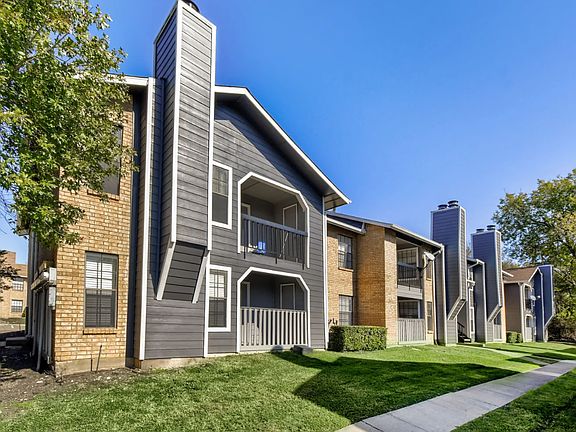 Beautifully maintained apartment community with updated exteriors and peaceful surroundings.