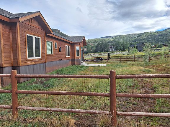 Back of house with endless mountain views