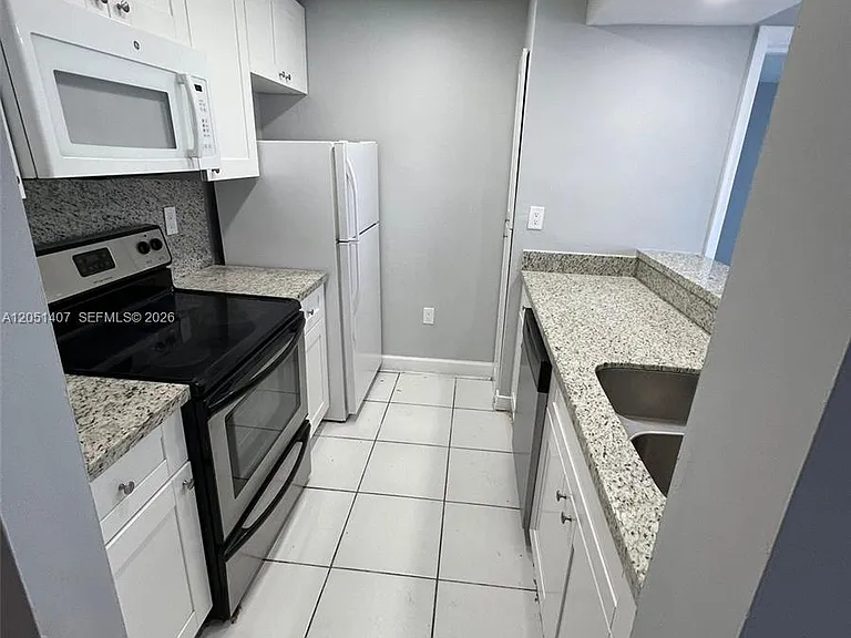 7035 NW 186th St #D509 — Photo 1