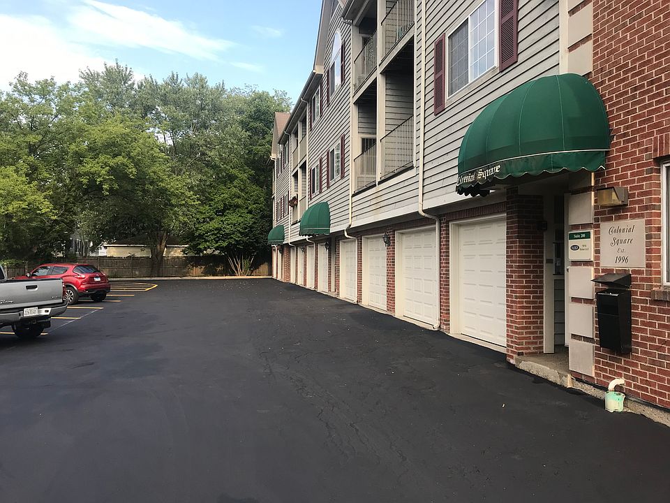 Entrance to Colonial Square, Private Garages & Guest Parking