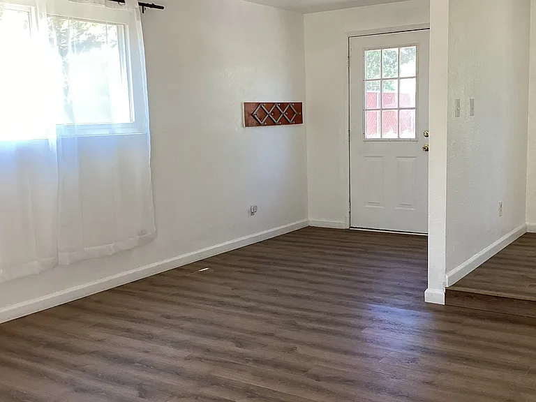Playroom with door to front.