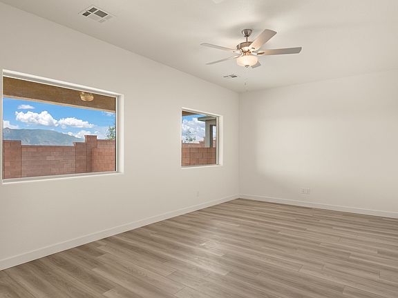 The living area is filled with natural lighting.