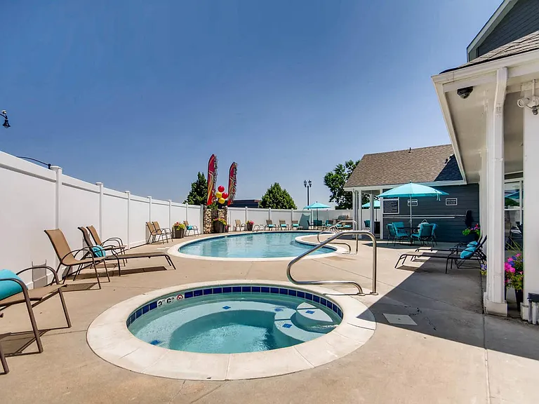 Our Outdoor Heated Pool and Year Round Hot Tub/Spa at Eagles Landing at Church Ranch Apartments