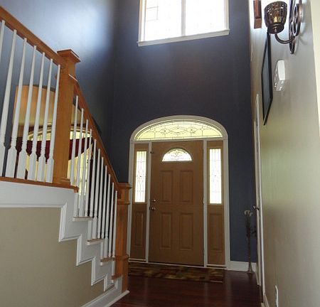 Foyer with high ceilings