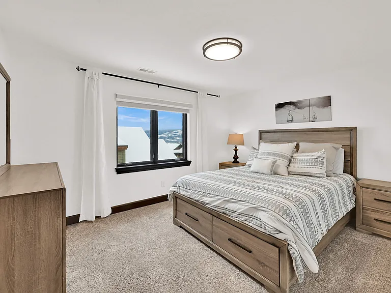 Upstairs bedroom with queen bed