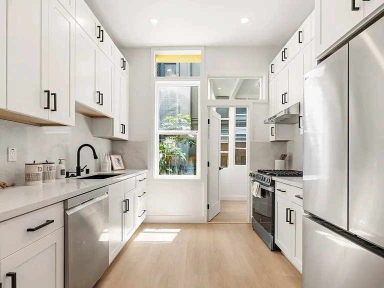 Brand new chefs kitchen with gas stove, dishwasher and tons of cabinets (virtually staged)