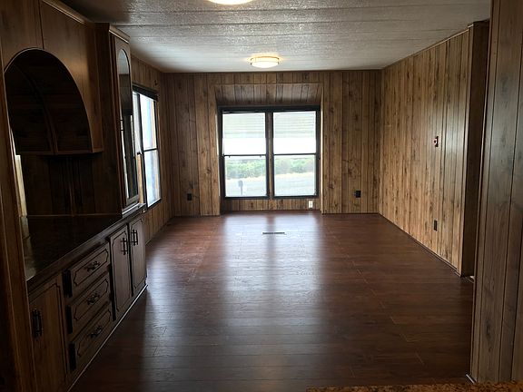 Dining Room with New vinyl flooring Built in hutch for dishes etc...