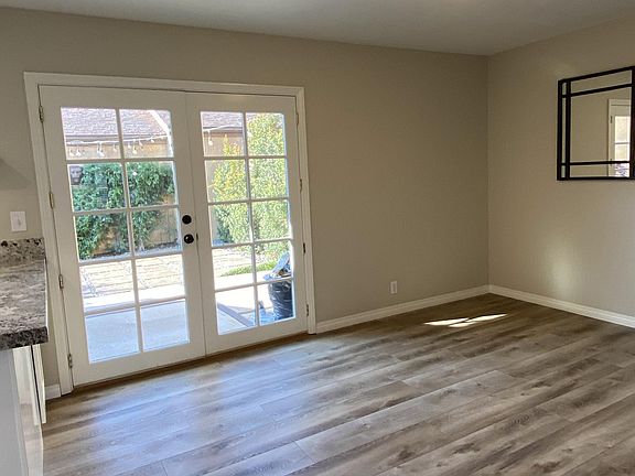 Dining room with french doors leading to courtyard