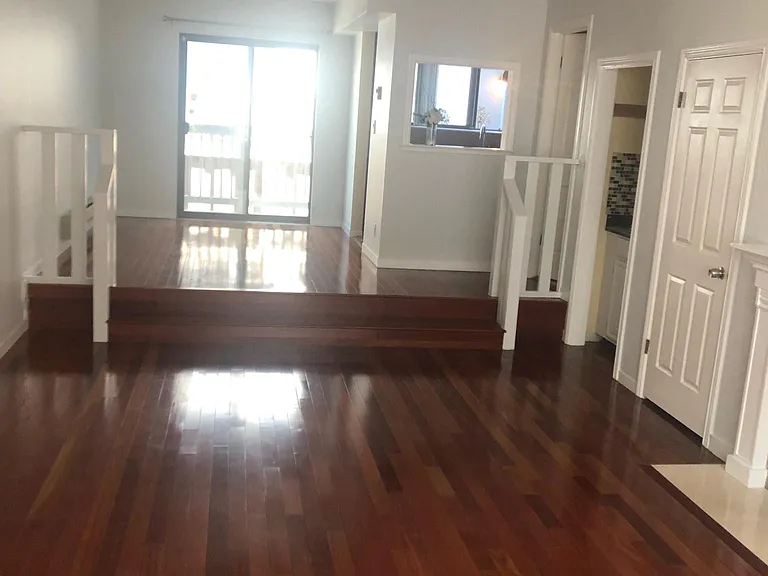 living room and dining room during daytime