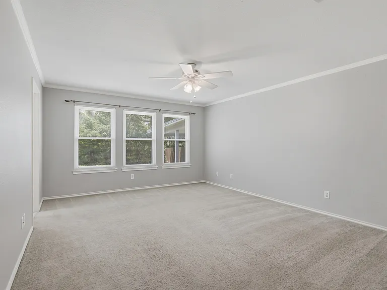 Primary bedroom has two walk in closets