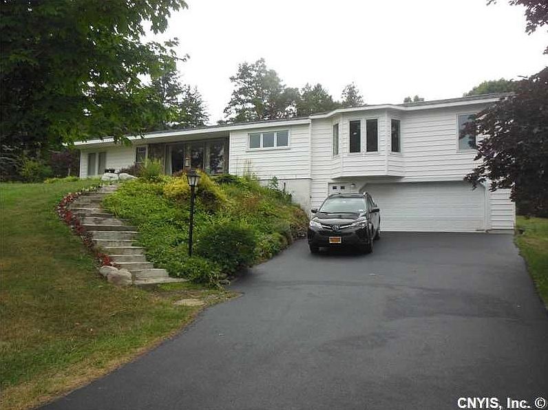 Exterior Front. Spacious raised ranch w/ double wide driveway!