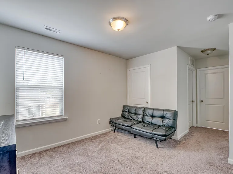 Loft space (door to an extra storage closet)