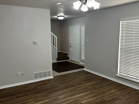 Front living room looking into entry/foyer.