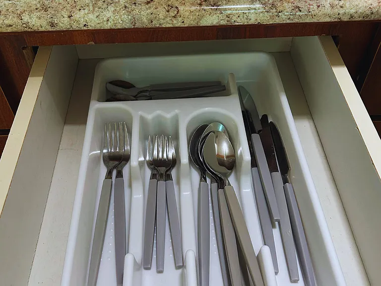 Complete set of forks, knives, and spoons for your dining needs.