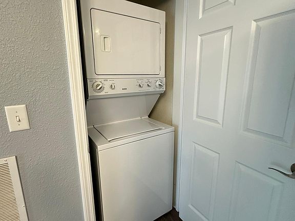Washer and dryer closet off kitchen area