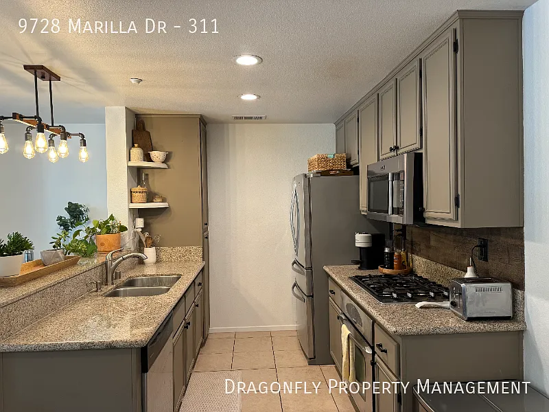Top Floor Condo In Gated Community — Photo 1