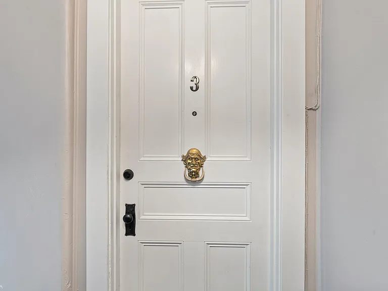 Front door to Apartment #3