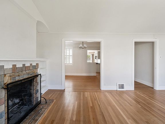 Looking into dining room and hall from living room